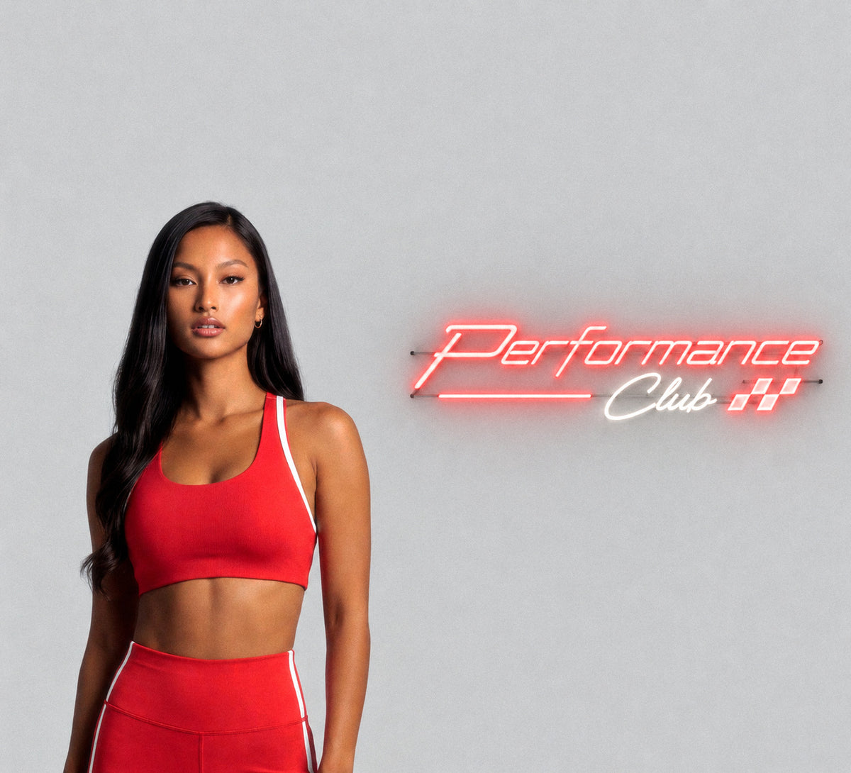 Top Tier Tier One red set — close-up front view and full-body rear view on a flat grey studio backdrop