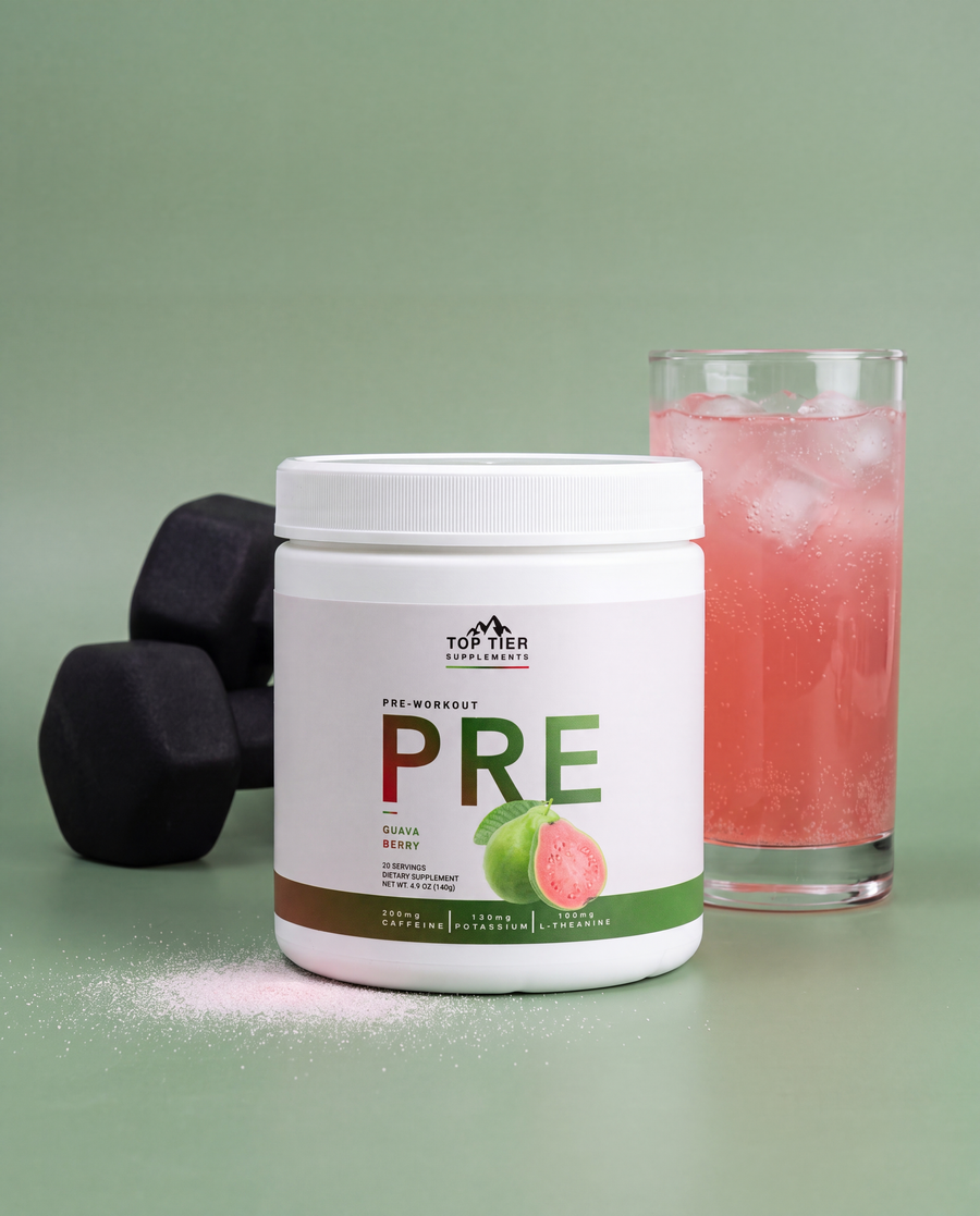 PRE Guava Berry pre-workout tub with two dumbbells and a glass of prepared guava berry drink