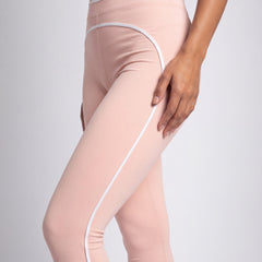 Tier One Leggings Light Pink leg close-up with white side piping